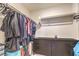Walk-in closet with ample storage, shelving, and built-in drawers at 6952 Midnight Bronze St, North Las Vegas, NV 89086