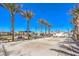 Community park with sidewalks, benches, palm trees, playground, and restrooms at 6952 Midnight Bronze St, North Las Vegas, NV 89086