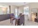 Bright dining area features modern furnishings and ample natural light at 6952 Midnight Bronze St, North Las Vegas, NV 89086