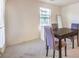 Bright dining area features modern furnishings and ample natural light at 6952 Midnight Bronze St, North Las Vegas, NV 89086