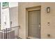 Exterior view of the front door and surrounding landscape at 6952 Midnight Bronze St, North Las Vegas, NV 89086