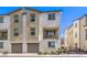Charming townhouse featuring a private balcony, two-car garage, and neutral color palette at 6952 Midnight Bronze St, North Las Vegas, NV 89086