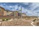 Community playground offering a fun, safe climbing net, with residential homes nearby and blue skies above at 6952 Midnight Bronze St, North Las Vegas, NV 89086