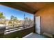 Charming balcony with serene view of neighborhood trees and street, perfect for morning coffee or evening relaxation at 7700 Constanso Ave # 204, Las Vegas, NV 89128