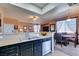 Kitchen featuring a sink with a view to the dining area and a comfortable Gathering room at 7700 Constanso Ave # 204, Las Vegas, NV 89128