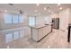 Spacious kitchen featuring granite countertops, stainless steel appliances, and a large kitchen island at 7708 Mojave Wind Ave, Las Vegas, NV 89113