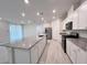 Spacious kitchen featuring granite countertops, stainless steel appliances, and a large kitchen island at 7708 Mojave Wind Ave, Las Vegas, NV 89113