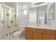 Well-lit bathroom featuring a vanity, mirror, and palm tree shower curtain at 774 Wigan Pier Dr, Henderson, NV 89002