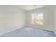 Bedroom featuring blue carpet, natural light, and views from a window at 774 Wigan Pier Dr, Henderson, NV 89002