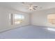 Large bedroom with a big window for natural light, and a ceiling fan at 774 Wigan Pier Dr, Henderson, NV 89002