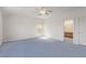 Bright bedroom with a ceiling fan, closet and access to bathroom at 774 Wigan Pier Dr, Henderson, NV 89002