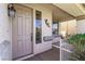 Close up of a front porch with an off-white front door and front window at 774 Wigan Pier Dr, Henderson, NV 89002