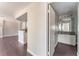 The entrance to the bathroom with updated cabinets and granite countertops at 8600 W Charleston Blvd # 2108, Las Vegas, NV 89117