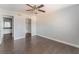 This is a spacious bedroom with wood floors and a ceiling fan at 8600 W Charleston Blvd # 2108, Las Vegas, NV 89117