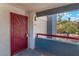 Unit entrance with a decorative security door and view of the community grounds at 8600 W Charleston Blvd # 2108, Las Vegas, NV 89117