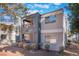 Stylish condo exterior with balconies and a desert landscape, showcasing a modern look at 8600 W Charleston Blvd # 2108, Las Vegas, NV 89117