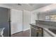 Bright, remodeled kitchen features stainless steel appliances, granite countertops, and an attached pantry at 8600 W Charleston Blvd # 2108, Las Vegas, NV 89117