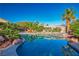 Sparkling pool featuring rock accents and tropical landscaping, perfect for relaxation and outdoor enjoyment at 8604 Amber Autumn St, Las Vegas, NV 89131