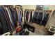Well-organized walk-in closet with an array of clothing and storage solutions, maximizing space and tidiness at 8824 Martin Downs Pl, Las Vegas, NV 89131