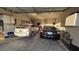 Spacious two-car garage with overhead storage and ample lighting at 8824 Martin Downs Pl, Las Vegas, NV 89131