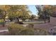Community park with green space, seating areas, and mature trees at 8824 Martin Downs Pl, Las Vegas, NV 89131
