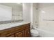 Bathroom vanity featuring a granite countertop, sink, bathtub and shower combo at 8920 Litchfield Ave, Las Vegas, NV 89134