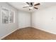 Inviting bedroom with ceiling fan, natural light, and convenient closet, ideal for rest at 8920 Litchfield Ave, Las Vegas, NV 89134