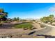 Beautiful golf course with mountain views within a community perfect for outdoor recreation and relaxation at 8920 Litchfield Ave, Las Vegas, NV 89134