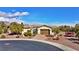 Charming single-story home with a well-maintained front yard, mature trees, and a gated entrance at , Las Vegas, NV 89131