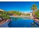 Resort style backyard pool with rock waterfall and lush landscaping creates a relaxing atmosphere at , Las Vegas, NV 89131