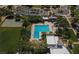 Aerial view of a community pool, basketball court, and green space providing recreational opportunities and promoting active living at 10709 Brinkwood Ave, Las Vegas, NV 89134