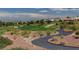 Expansive golf course view with lush greens, sand traps, and mature trees in a desirable community at 10709 Brinkwood Ave, Las Vegas, NV 89134