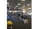 Well-equipped gym featuring treadmills, weight machines, and ample workout space at 10709 Brinkwood Ave, Las Vegas, NV 89134