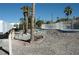 The desert-landscaped backyard features stairs leading to the pool area at 1108 Sidehill Way, Las Vegas, NV 89110