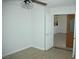 Cozy bedroom featuring neutral-toned flooring and a ceiling fan at 1108 Sidehill Way, Las Vegas, NV 89110