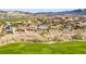 Aerial view of luxury homes with pools in a meticulously landscaped community near a golf course at 1223 Casa Palermo Cir, Henderson, NV 89011