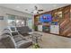 Inviting living room with a cozy fireplace and comfortable seating arrangement at 1223 Casa Palermo Cir, Henderson, NV 89011