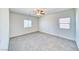 Bedroom with neutral walls, plush carpet and ample natural light at 1580 S Outlaw St, Pahrump, NV 89060