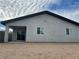 New home backyard featuring a covered patio, stucco exterior, and ample space for landscaping at 1838 Princeton St, North Las Vegas, NV 89030