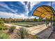 Well-maintained bocce ball courts with covered seating for residents' enjoyment at 1964 Oliver Springs St, Henderson, NV 89052