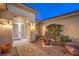 Charming courtyard with a decorative fountain and inviting front doors at 1964 Oliver Springs St, Henderson, NV 89052