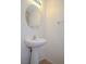 View of a half bathroom with a pedestal sink at 2050 N Los Feliz St # 176, Las Vegas, NV 89156