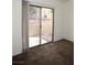 Bedroom with sliding glass doors leading to a patio area at 2050 N Los Feliz St # 176, Las Vegas, NV 89156