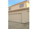 Spacious two-car garage offering secure parking and additional storage space at 2050 N Los Feliz St # 176, Las Vegas, NV 89156