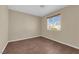 Simple bedroom featuring wood-look floors and a window with natural light at 2136 Velvet Hill Ave, Las Vegas, NV 89106