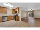 Inviting kitchen featuring stainless steel appliances, wooden cabinets, tile floors, and ample counter space at 2136 Velvet Hill Ave, Las Vegas, NV 89106