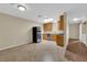 Bright kitchen with neutral walls, tile floors, stainless steel appliances, and ample cabinet space at 2136 Velvet Hill Ave, Las Vegas, NV 89106