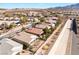 Nice aerial view of homes within a community with a concrete canal at 2633 Flare Star Dr, Henderson, NV 89044