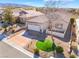 An elevated view of a well-maintained house showcasing the front yard and roof at 2633 Flare Star Dr, Henderson, NV 89044