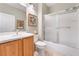 Bathroom with a shower, bathtub, sink and toilet at 2633 Flare Star Dr, Henderson, NV 89044